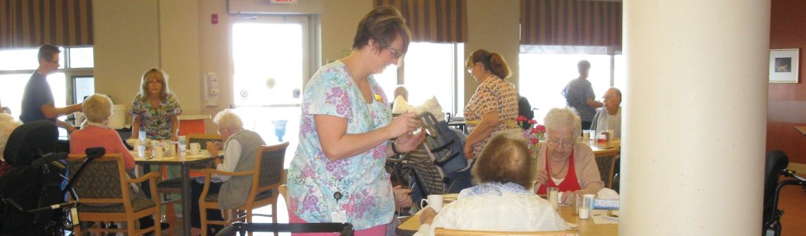 Nurse with residents 